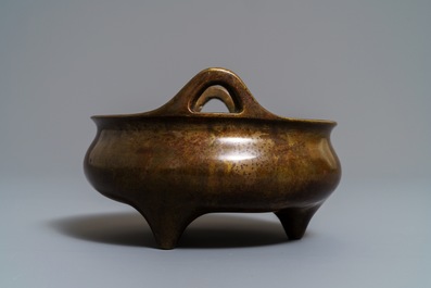 A Chinese bronze tripod censer, Xuande mark, 19th C.