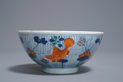 A Chinese doucai bowl with fish in a lotus pond, Xuande mark, Kangxi