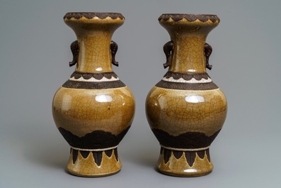 A pair of Chinese 'Nanking' brown monochrome-glazed vases, 19th C.