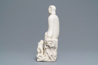 A Chinese Dehua blanc de Chine group of Guanyin with a tiger, 18/19th C.