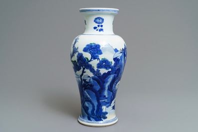 A Chinese blue and white 'river landscape' baluster vase with overglaze accents, Kangxi