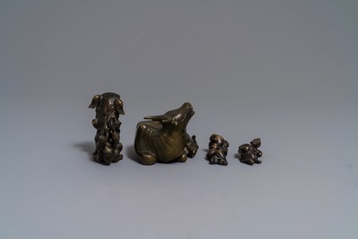 Four Chinese bronze scroll weights, 18/19th C.