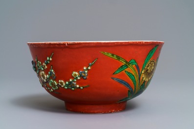 A Chinese coral-red relief-decorated bowl, 19th C.