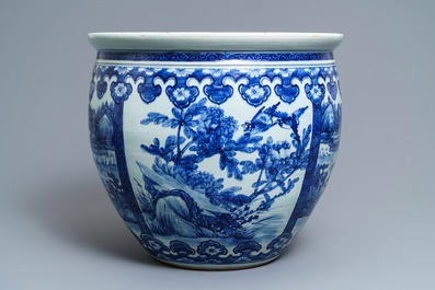 A Chinese blue and white fish bowl with landscape panels, 19th C.