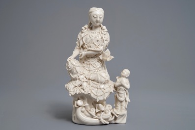 Two Chinese Dehua blanc de Chine models of a Luohan and Guanyin with servant, 19th C.