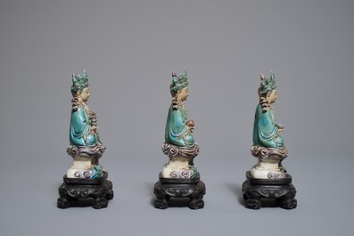 Three Chinese enamel on biscuit figures of Buddha, 19/20th C.