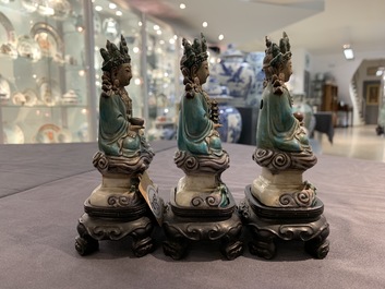 Three Chinese enamel on biscuit figures of Buddha, 19/20th C.