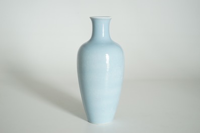 A Chinese monochrome lavender-blue vase with underglaze design, Yongzheng mark, 19th C.