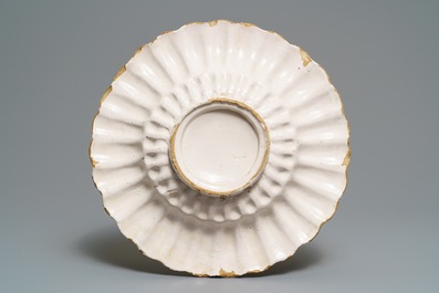 A white Dutch Delft gadrooned dish, 17th C.