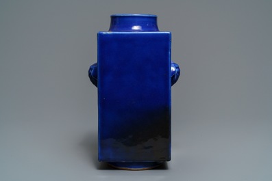 A Chinese calligraphy plaque dated 1947 and a monochrome blue cong vase, 19th C.