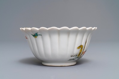 A Japanese Kakiemon fluted bowl and a small plate, Edo, 18th C.