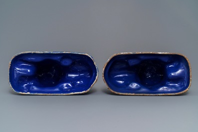 A pair of blue-ground models of recumbent lions, Saint-Omer, France, late 18th C.