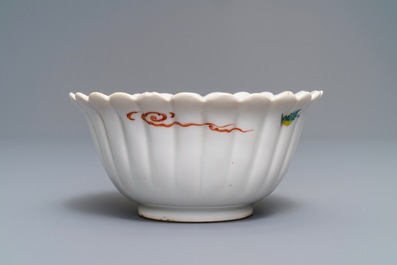 A Japanese Kakiemon fluted bowl and a small plate, Edo, 18th C.