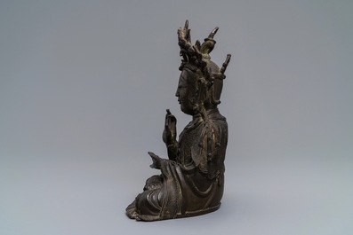 A Chinese bronze model of Guanyin, Ming