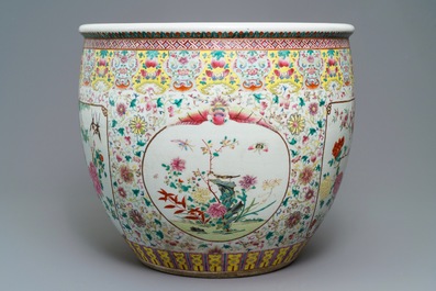 A large Chinese famille rose fish bowl with birds among flowers, 19th C.