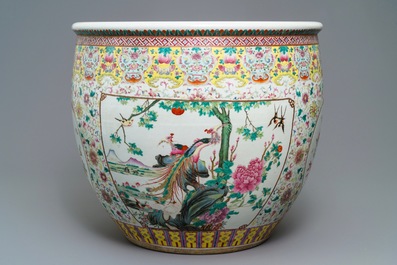 A large Chinese famille rose fish bowl with birds among flowers, 19th C.