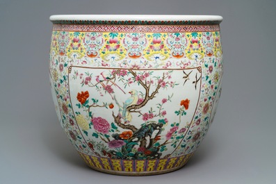A large Chinese famille rose fish bowl with birds among flowers, 19th C.