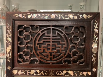 A Chinese mother-of-pearl inlaid wooden screen with silk paintings, 19th C.