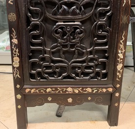 A Chinese mother-of-pearl inlaid wooden screen with silk paintings, 19th C.