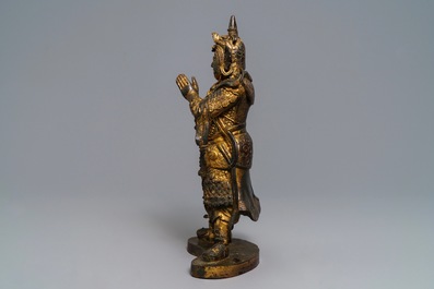 A Chinese gilt-lacquered bronze figure of Weituo, Ming