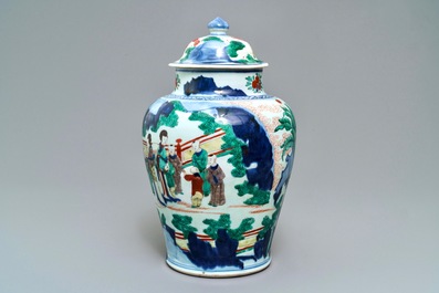 A Chinese wucai baluster vase and cover with playing boys, Transitional period