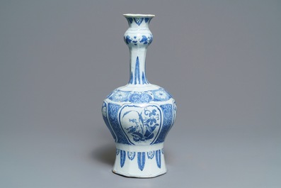 A tall Dutch Delft blue and white chinoiserie vase, late 17th C.