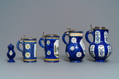 Four pewter-mounted Brussels faience jugs and a shaker, 18/19th C.