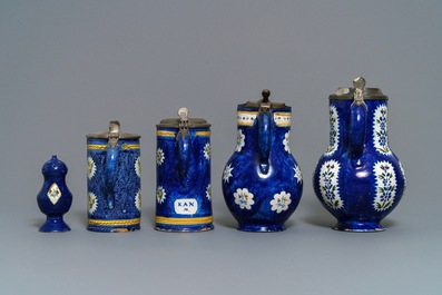 Four pewter-mounted Brussels faience jugs and a shaker, 18/19th C.