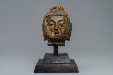 A Chinese carved stone head of Buddha Shakyamuni, Ming or later