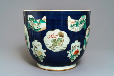 A Chinese blue-ground famille verte fishbowl, 19th C.