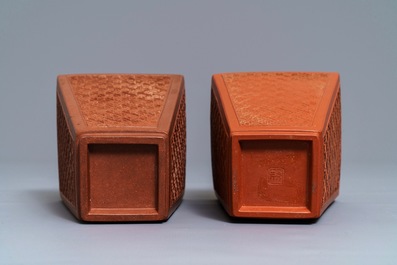 A pair of Chinese Yixing stoneware relief-decorated tea caddies, seal mark, 18th C.