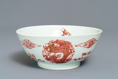 A Chinese underglaze red 'dragons and fish' bowl, 19/20th C.