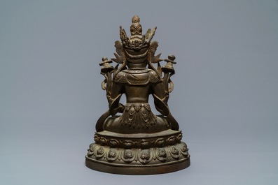 A Chinese bronze figure of Guanyin, Ming