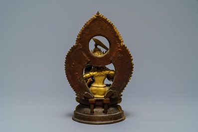 A Tibetan inscribed gilt bronze group of Manjusri and Prajnaparamita, 17/18th C.