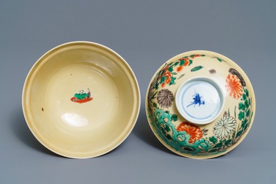 A Chinese famille verte caf&eacute;-au-lait-ground bowl and cover, Kangxi