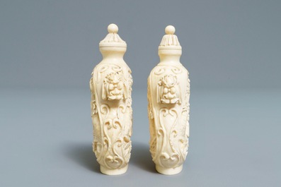 A pair of Chinese carved ivory snuff bottles, 19th C.