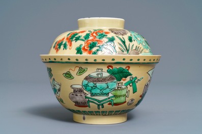 A Chinese famille verte caf&eacute;-au-lait-ground bowl and cover, Kangxi