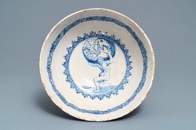 A fine and large Dutch Delft blue and white 'maritime subject' bowl depicting Atlas, 18th C.