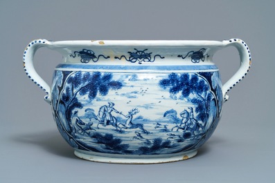 A large Dutch Delft blue and white 'deer hunting' jardiniere, 18th C.