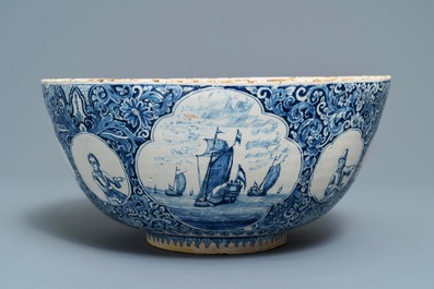 A fine and large Dutch Delft blue and white 'maritime subject' bowl depicting Atlas, 18th C.