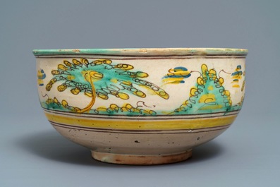 A large polychrome Spanish bowl with a bull, Talavera, 18th C.