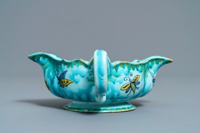 A Brussels faience sauce boat with butterflies and caterpillars, late 18th C.