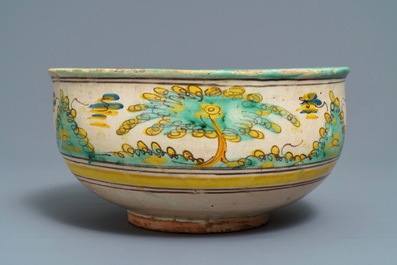 A large polychrome Spanish bowl with a bull, Talavera, 18th C.