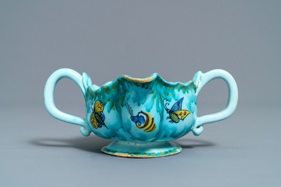 A Brussels faience sauce boat with butterflies and caterpillars, late 18th C.