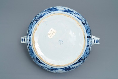 A large Dutch Delft blue and white 'deer hunting' jardiniere, 18th C.