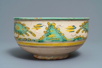 A large polychrome Spanish bowl with a bull, Talavera, 18th C.