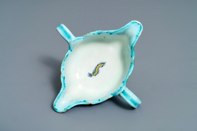 A Brussels faience sauce boat with butterflies and caterpillars, late 18th C.