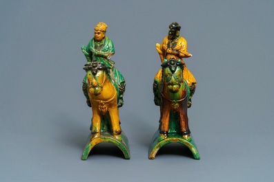 Two Chinese yellow and green-glazed 'horserider' roof tiles, Ming