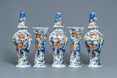 A polychrome Dutch Delft five-piece garniture with romantic design, 18th C.