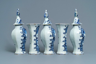 A Dutch Delft blue and white five-piece garniture with pastoral design, 18th C.